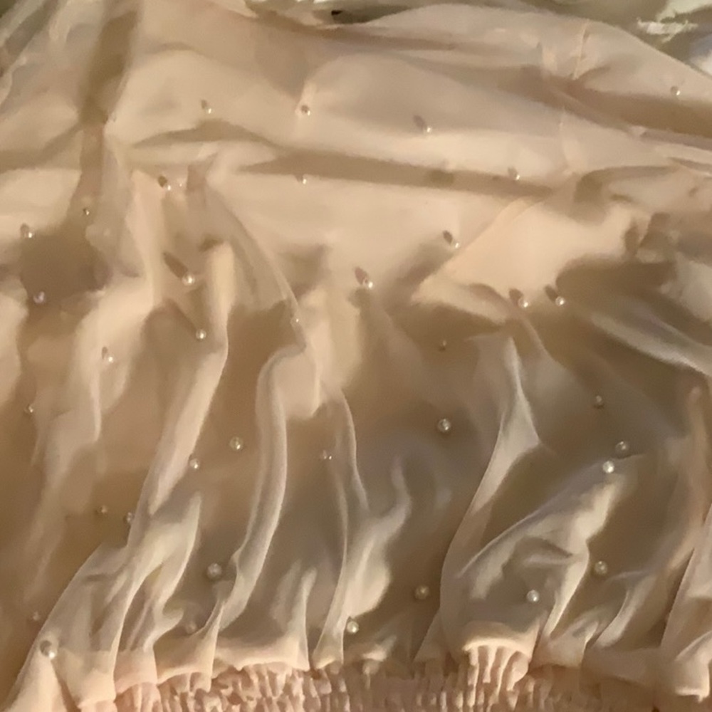 Cute little pleated mini in earth tone colors